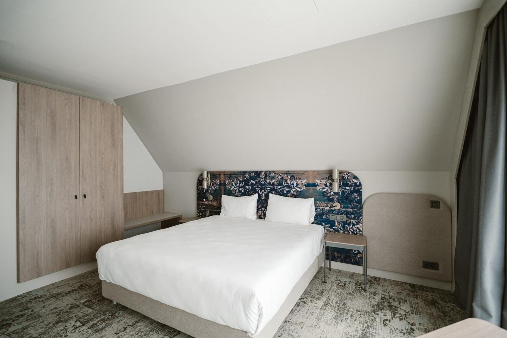 Suite con 1 cama doble y 1 sofá cama