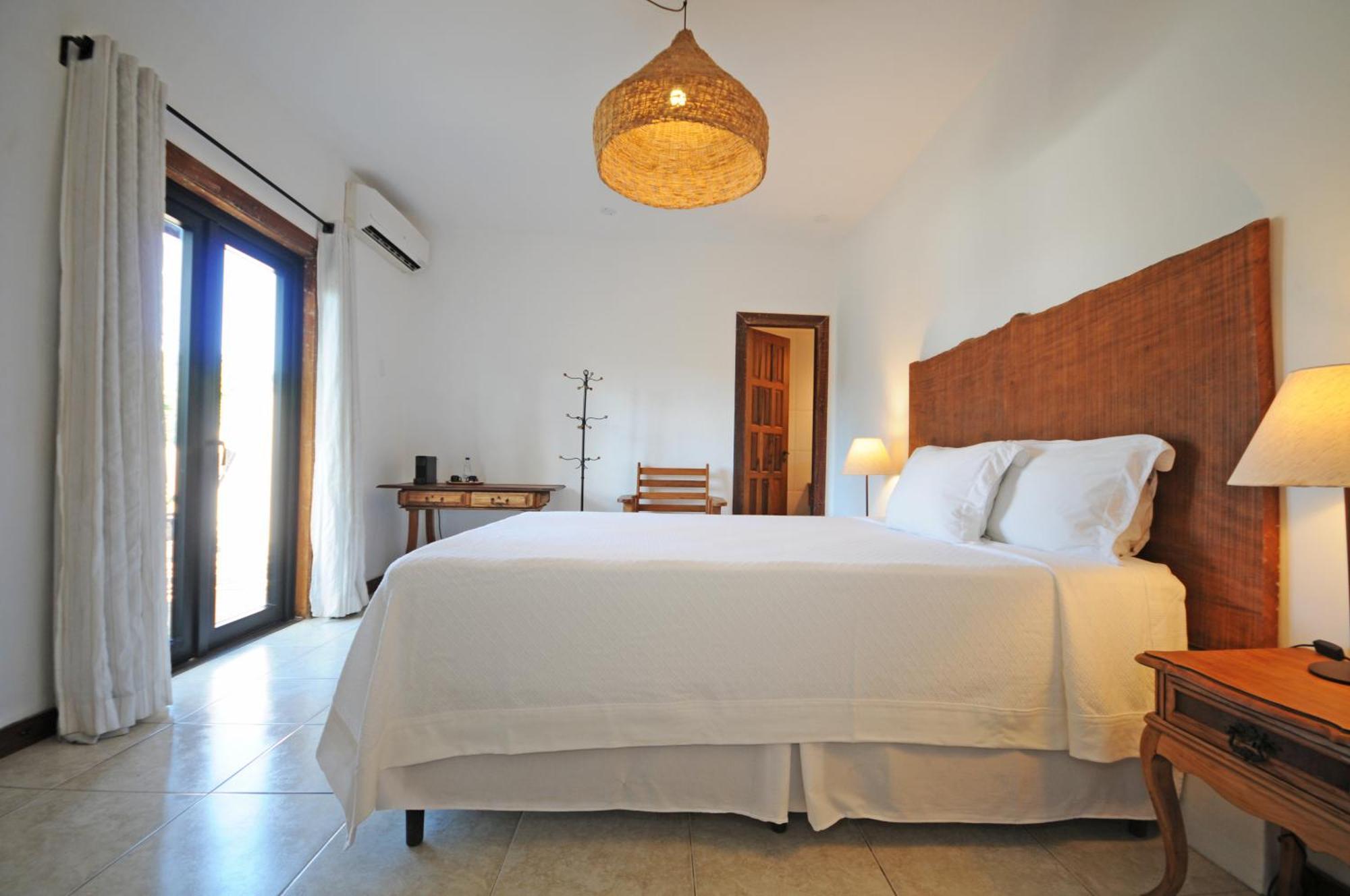 Quarto com Varanda.