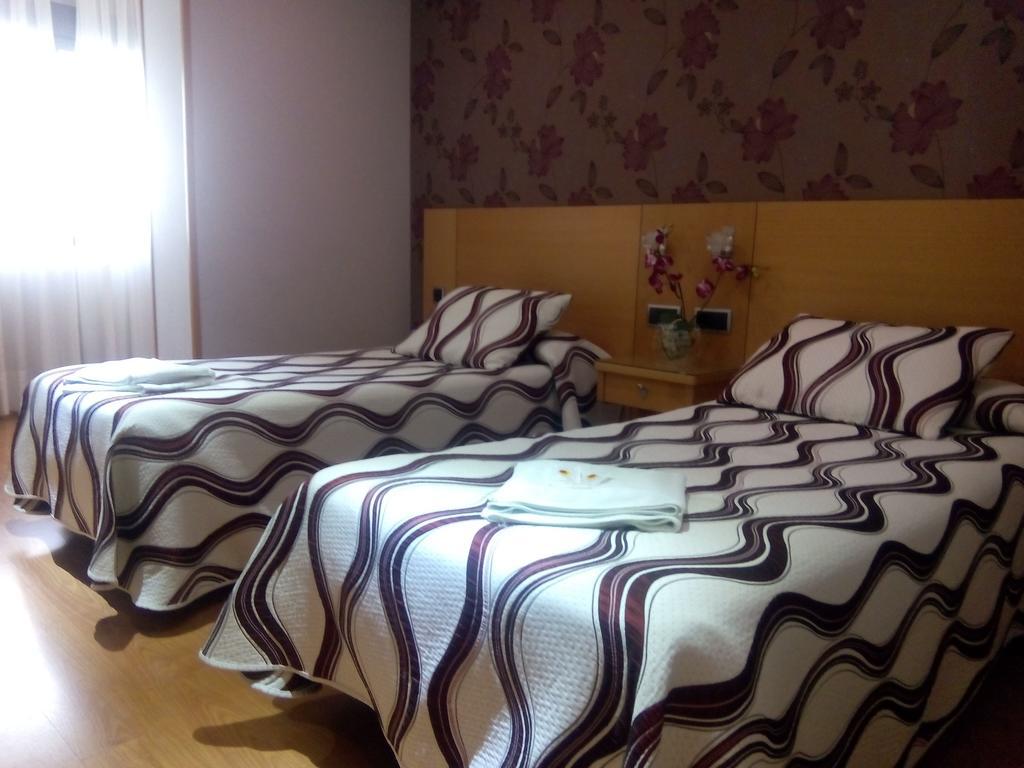 Tweepersoonskamer met 2 Aparte Bedden