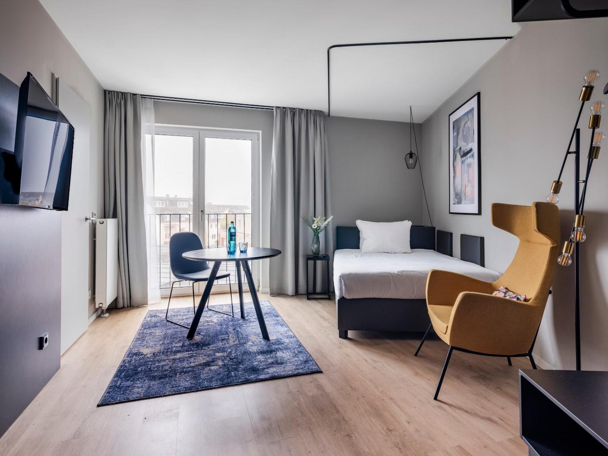 Mittleres Studio mit Küchenzeile – Einzelbett, Zugang zum Aufzug