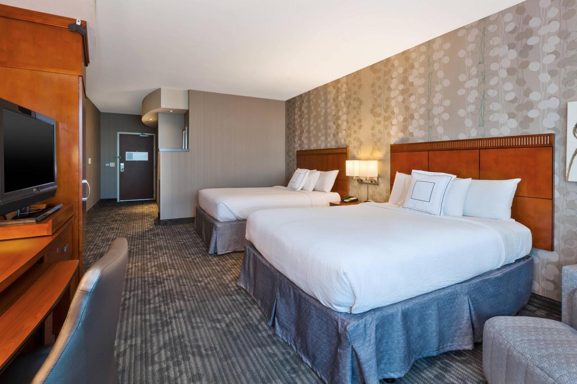 Queen Suite with Two Queen Beds and Sofa Bed