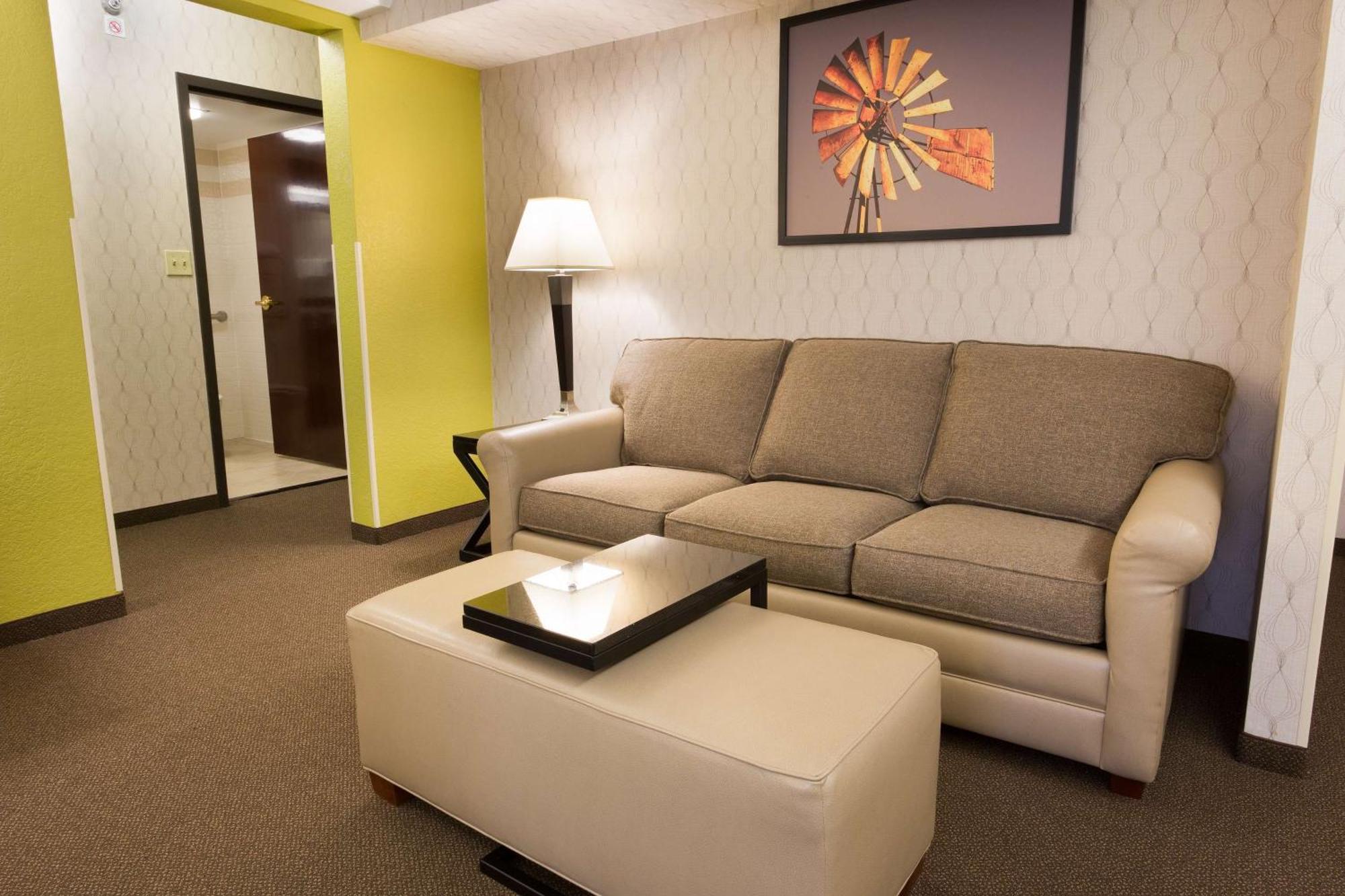 Habitación Deluxe con cama extragrande y sofá cama