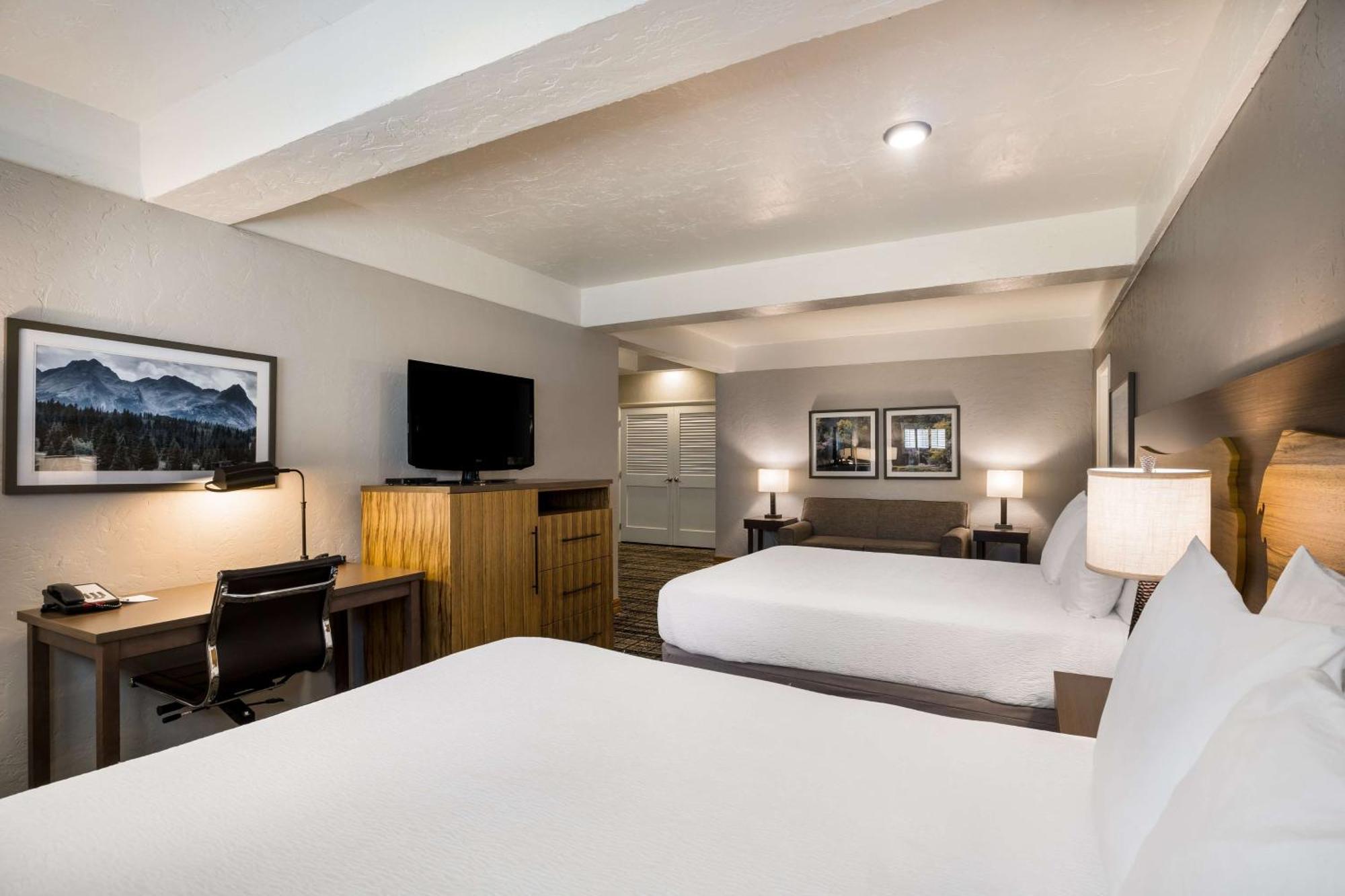 Queen Suite with Four Queen Beds and Sofa Bed