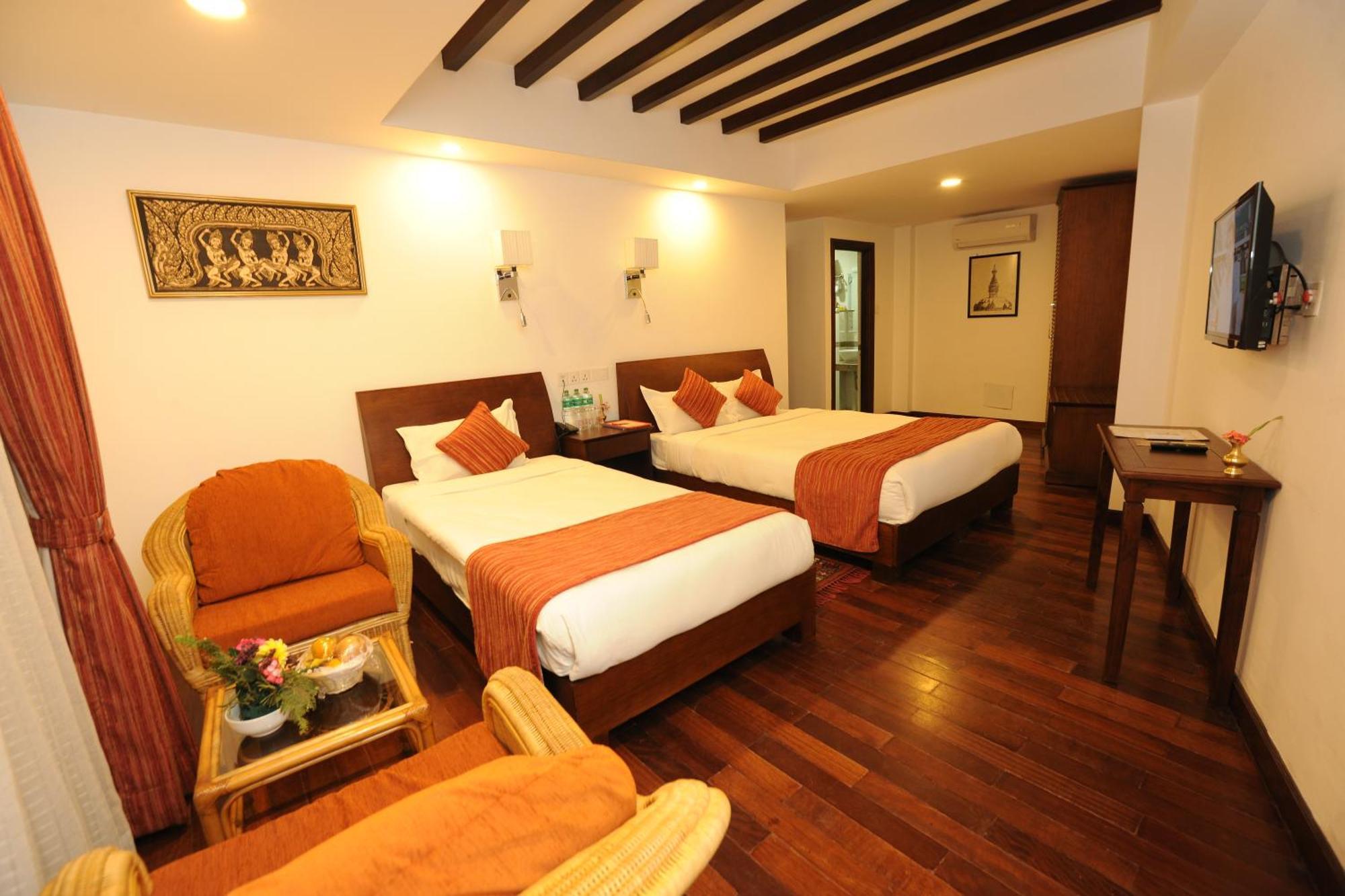 Deluxe Triple Room Garden View