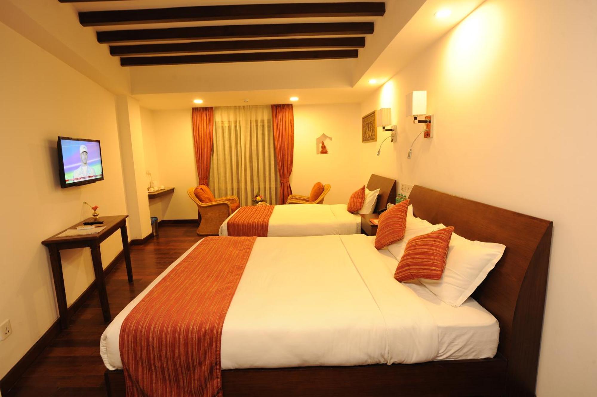 Deluxe Triple Room Garden View