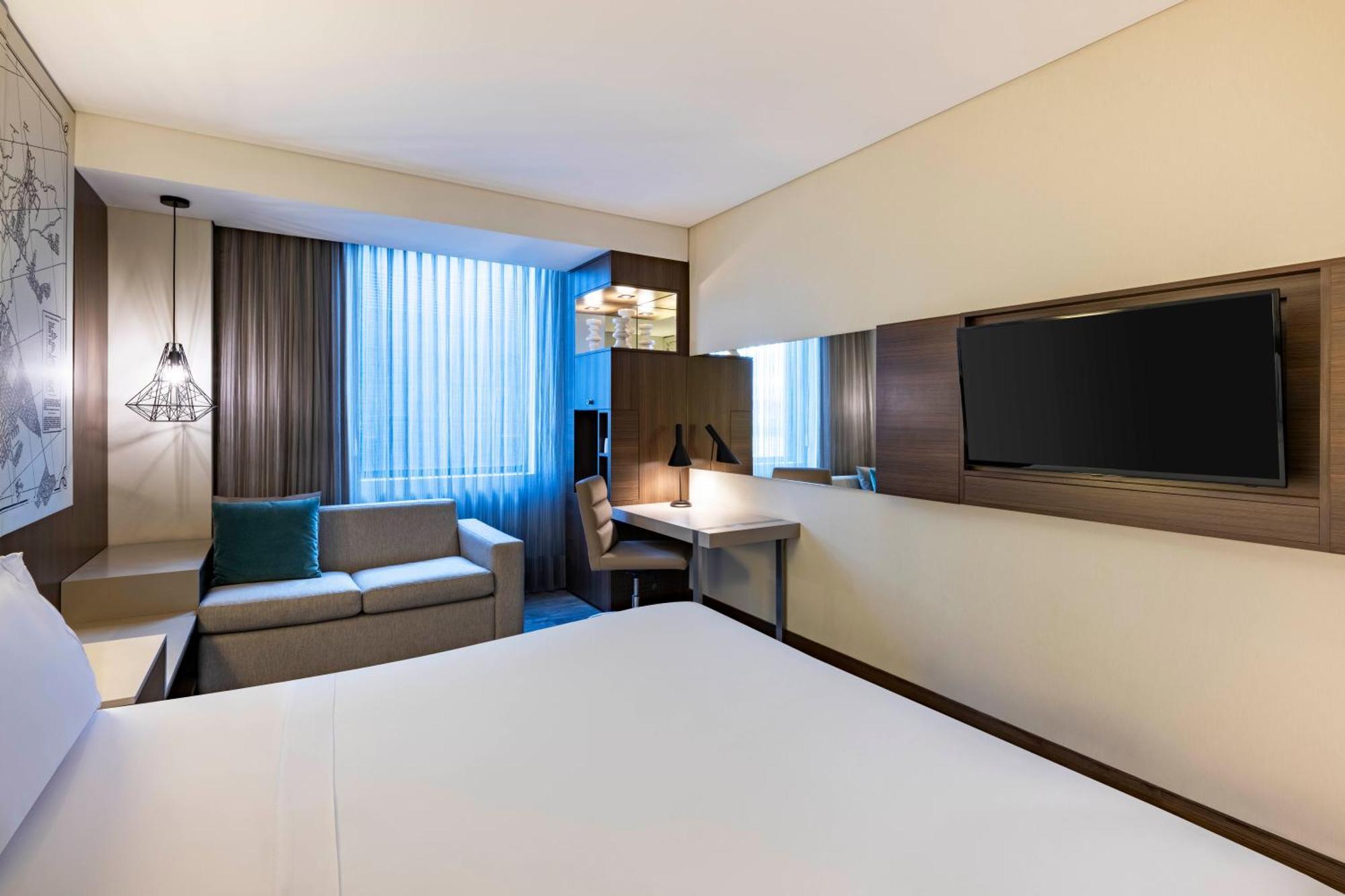 Quarto King Superior com Sofá-Cama