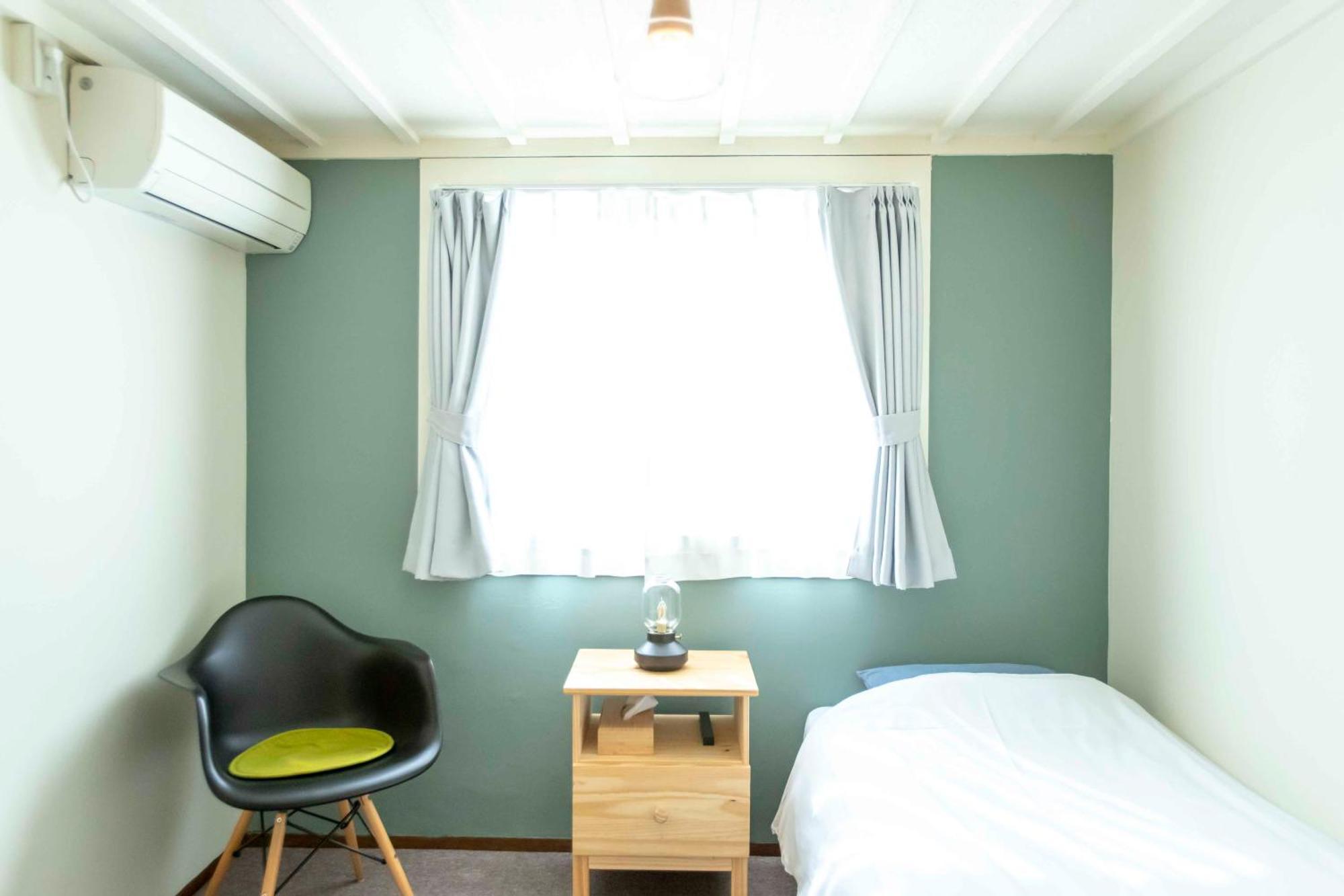Single Room with Shared Shower and Toilet