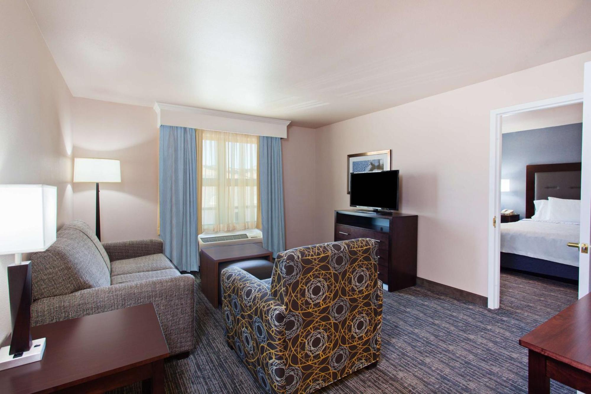 Two Bedroom Suite with One King and Two Queen Beds - Non-Smoking