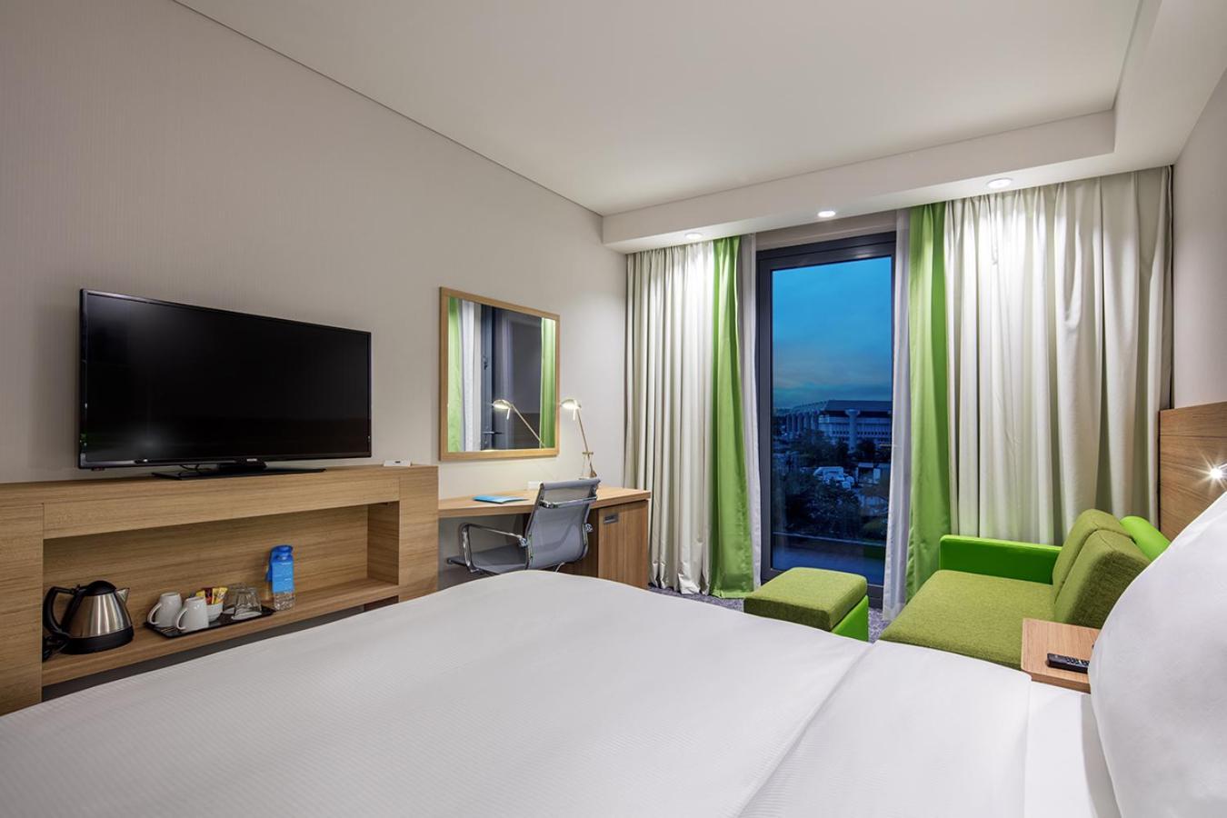 Kamer met Queensize Bed en Slaapbank