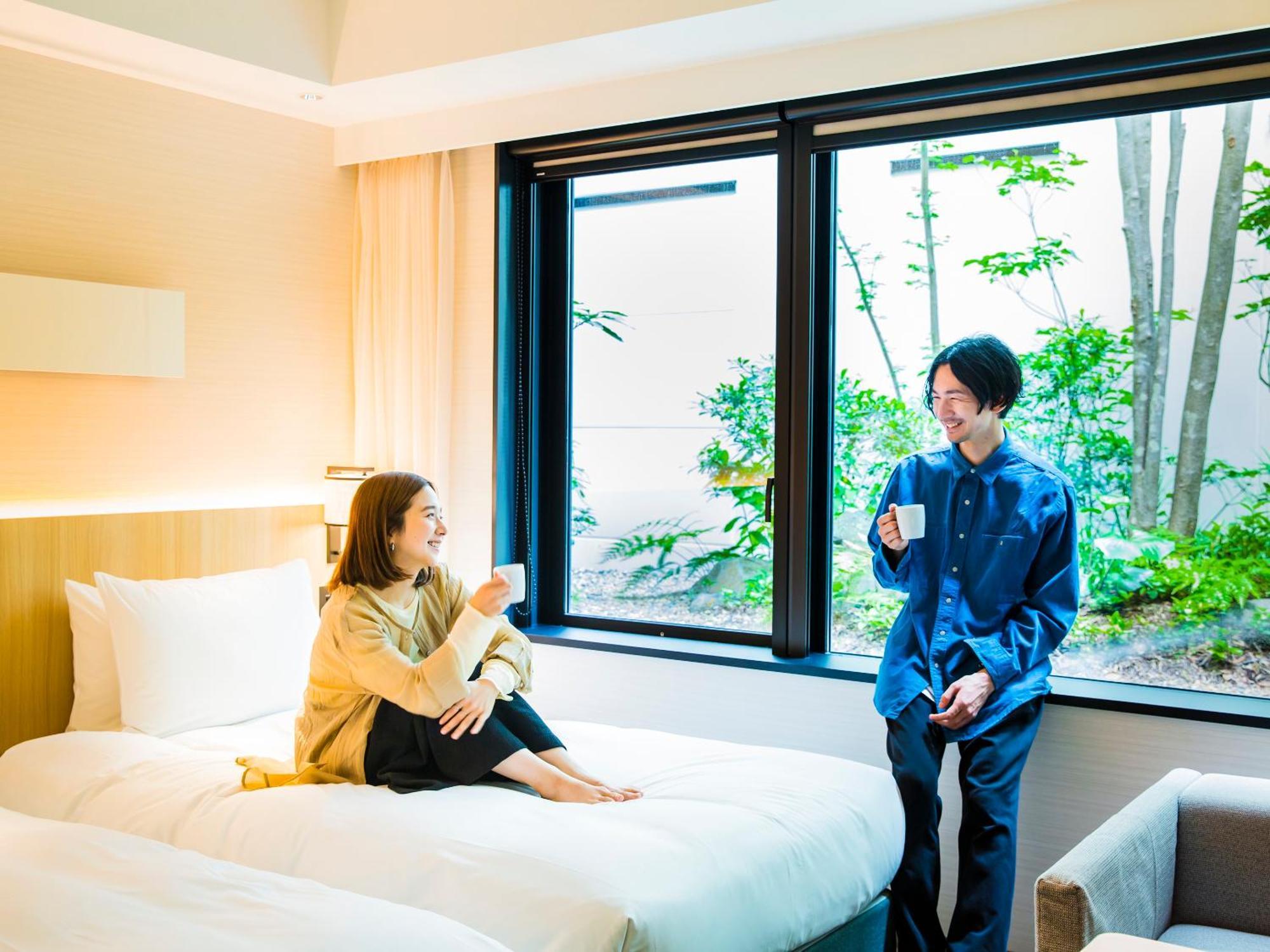 Twin Room Bathtub Garden View,1391838176:JPEG