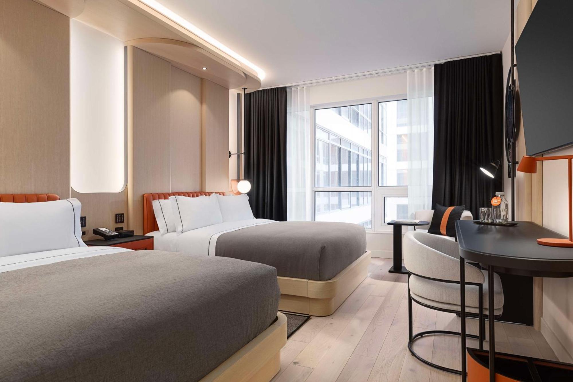 Corner Queen Room with Two Queen Beds and City View