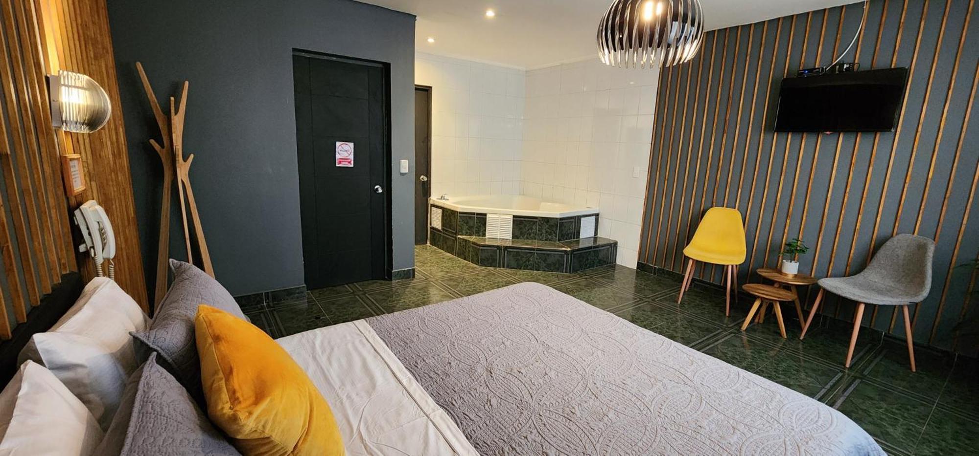 Quarto Duplo com Banheira de Hidromassagem