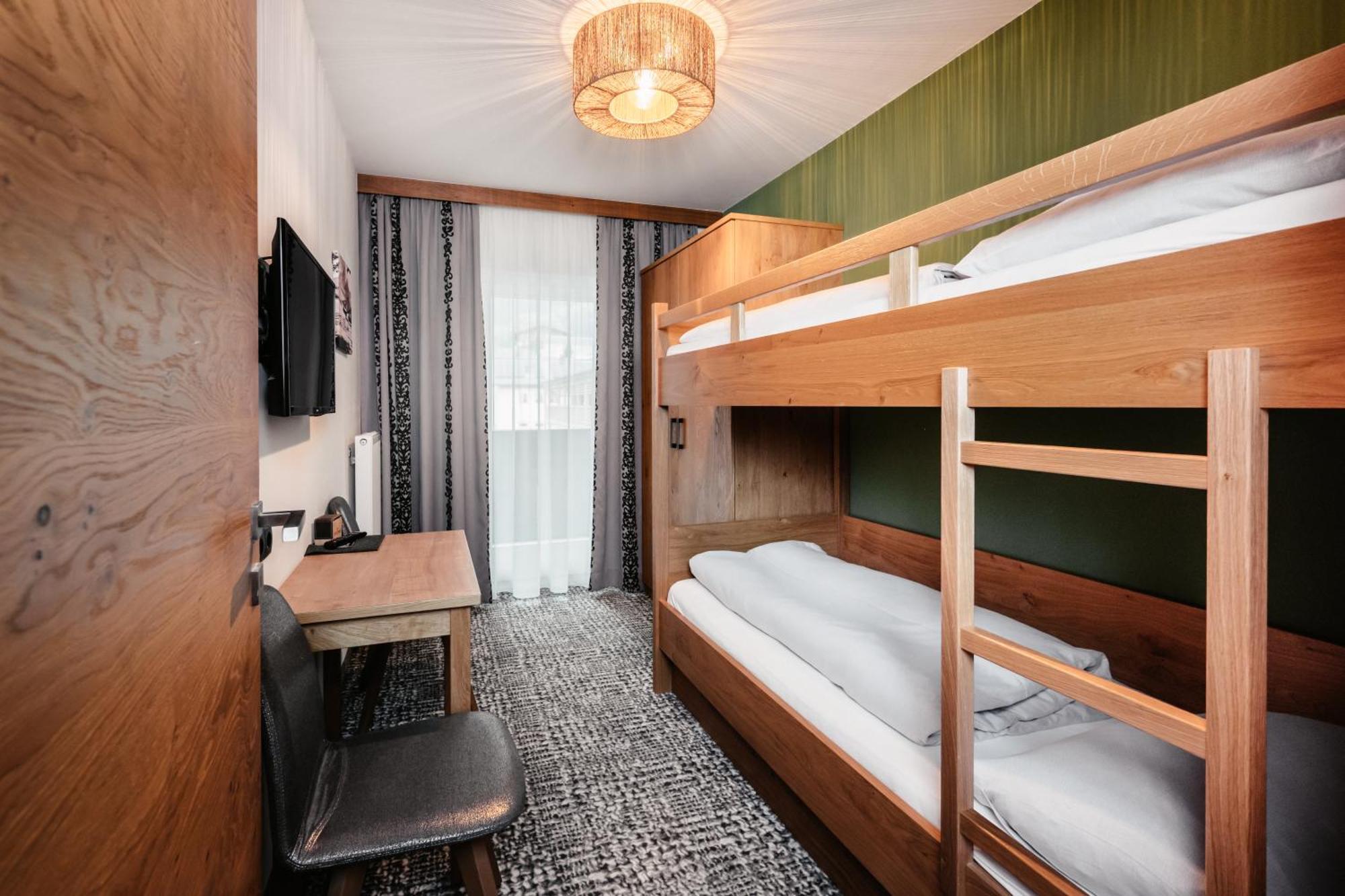 Family Room with Balcony (2 Adults + 2 Children)