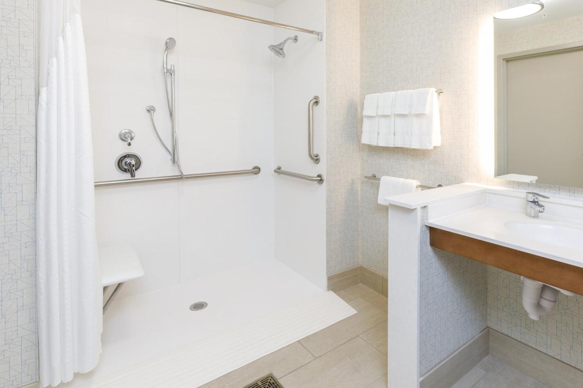 King Suite Roll Shower Communications or Mobility Accessible