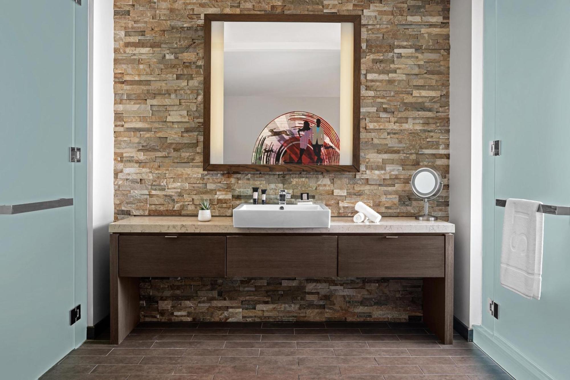 Premier King Suite with Roll-In Shower and Balcony - Wet Deck View/Mobility and Hearing Accessible