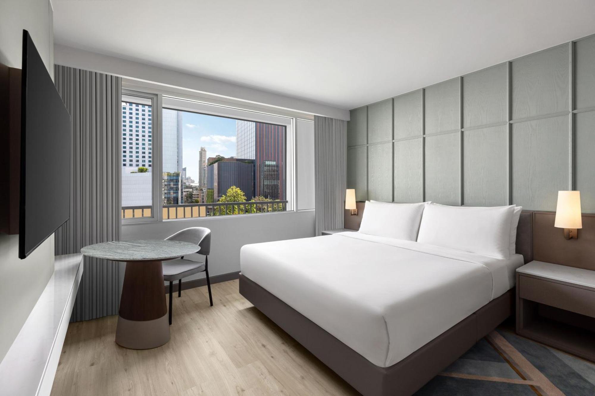 Habitación Doble Deluxe con cama extragrande y vistas a la ciudad