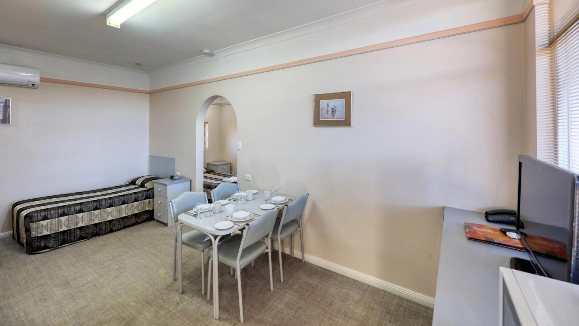 Room with Four Single Beds
