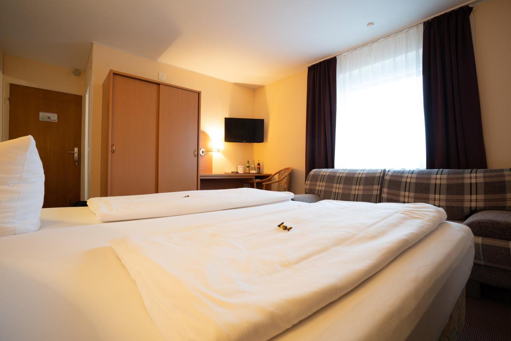 Dreibettzimmer