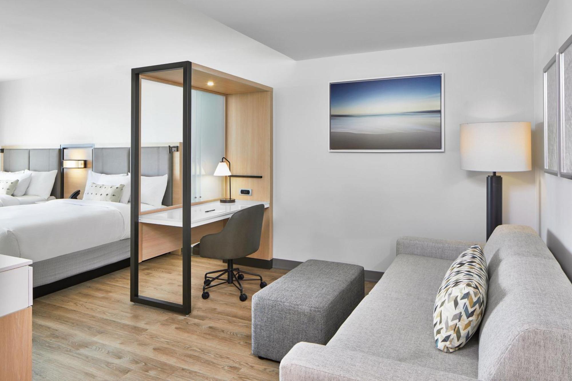 Studio Two Queen Beds Partial Ocean View Bathtub Trundle Sofa Balcony Mobility Access or Hearing Accessible