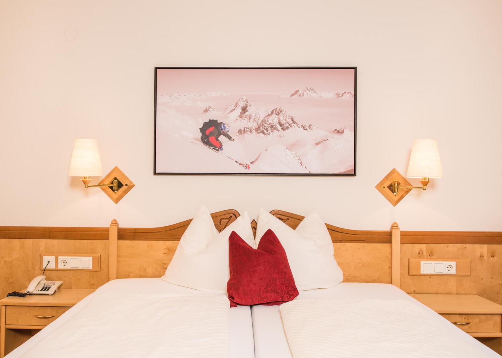 Doppelzimmer mit Balkon (2 Erwachsene + 1 Kind)