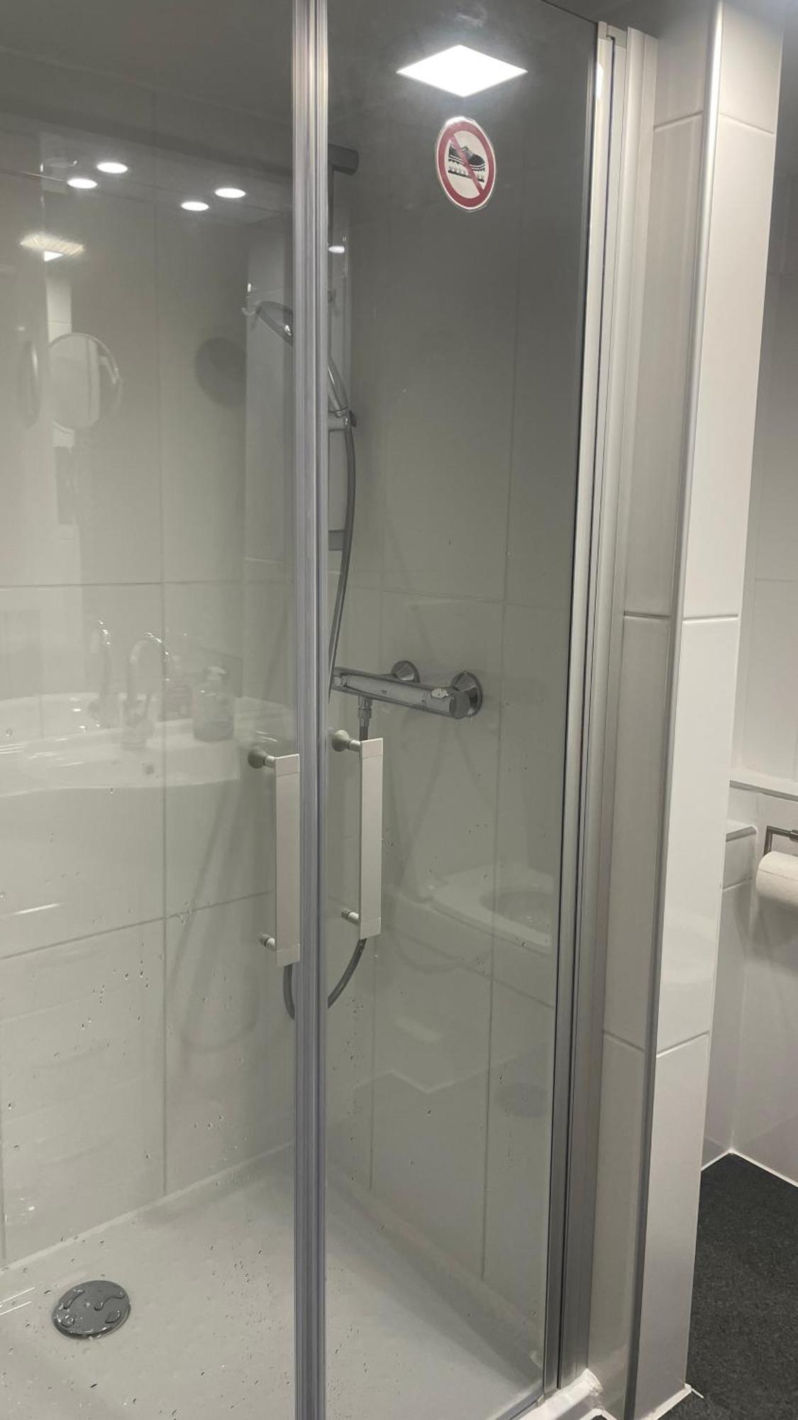 Family Room Private Bathroom,1563481855:JPEG