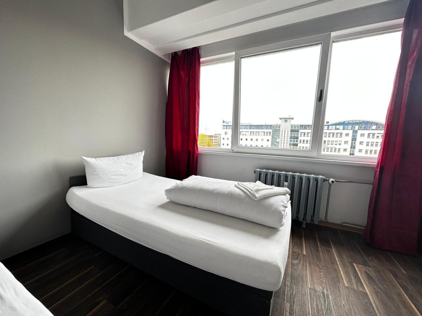 Tweepersoonskamer met 2 Aparte Bedden