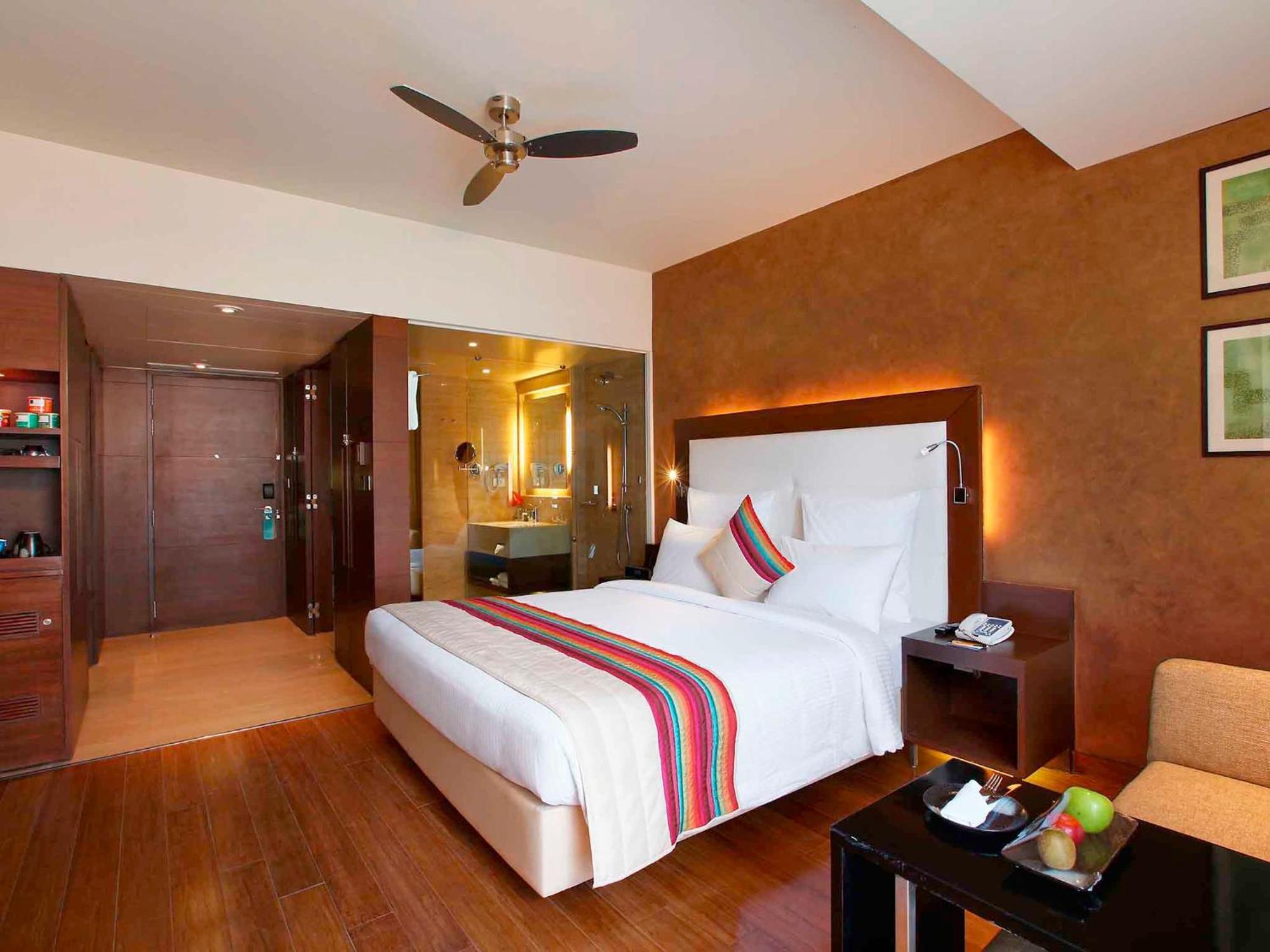 Deluxe King Room  - INR 500 Credit on SPA per stay - Happy Hours 1+1 (5pm to 7pm) - 15% Discount on Food & Beverages - 10% Discount on One way Local transfers