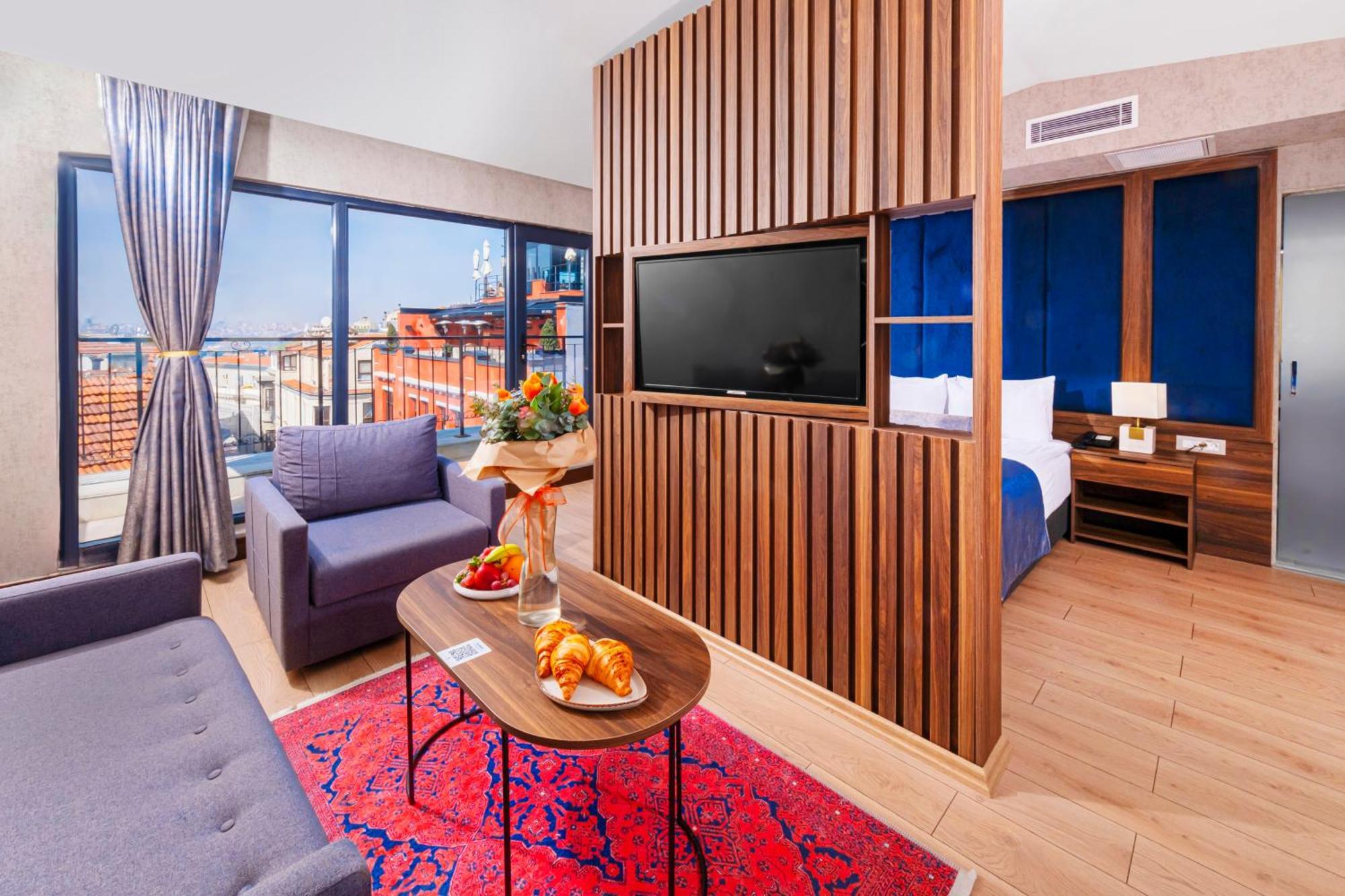 Suite Lit King-Size avec Balcon