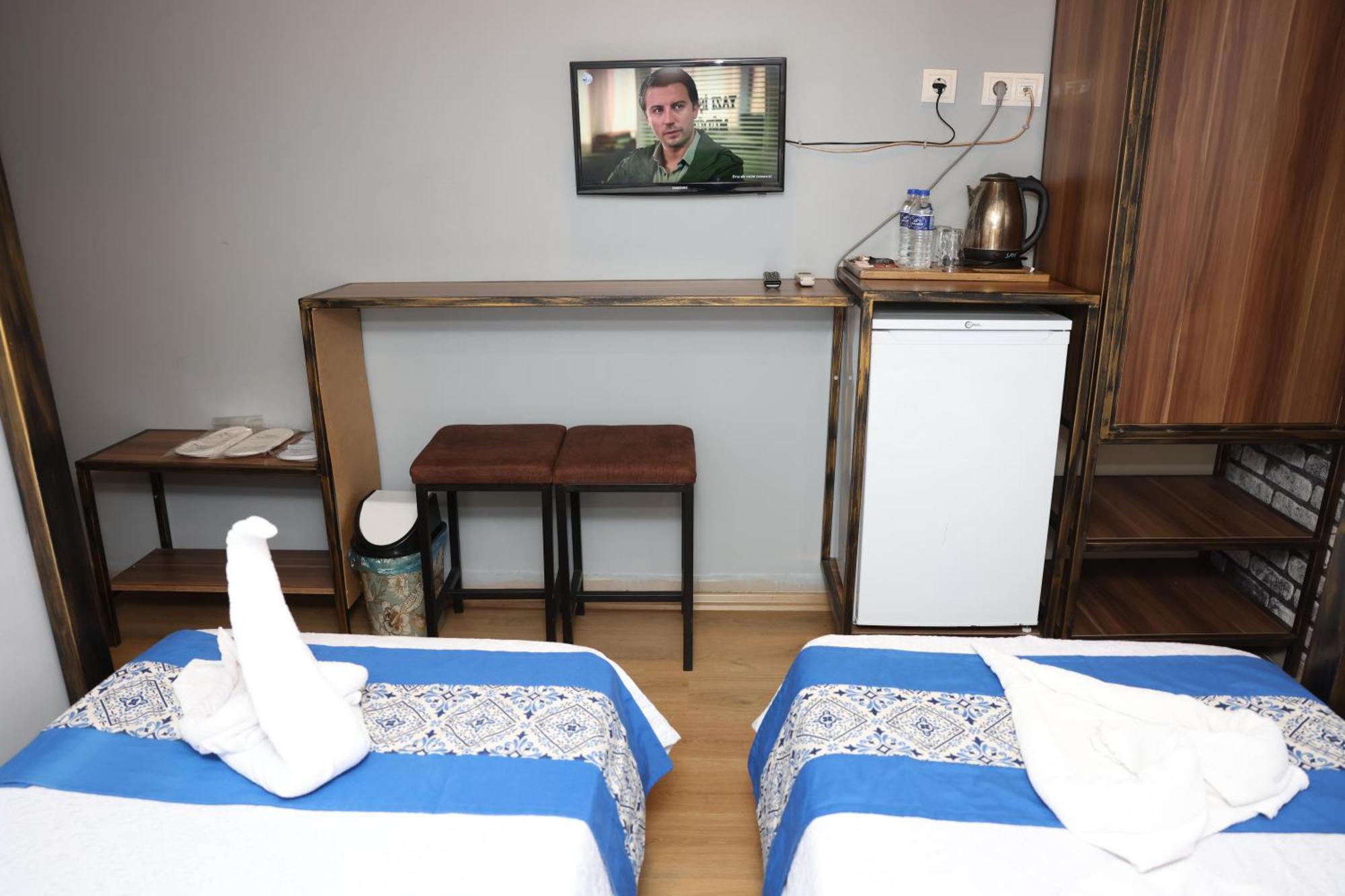 Deluxe Üç Kişilik Oda