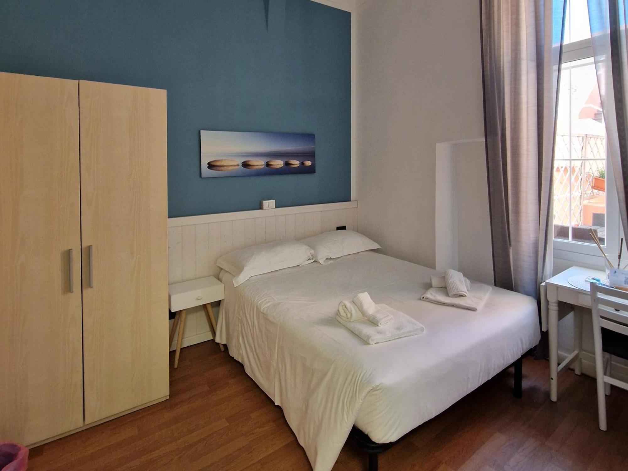 Chambre Double Deluxe (1 Adulte + 1 Enfant)