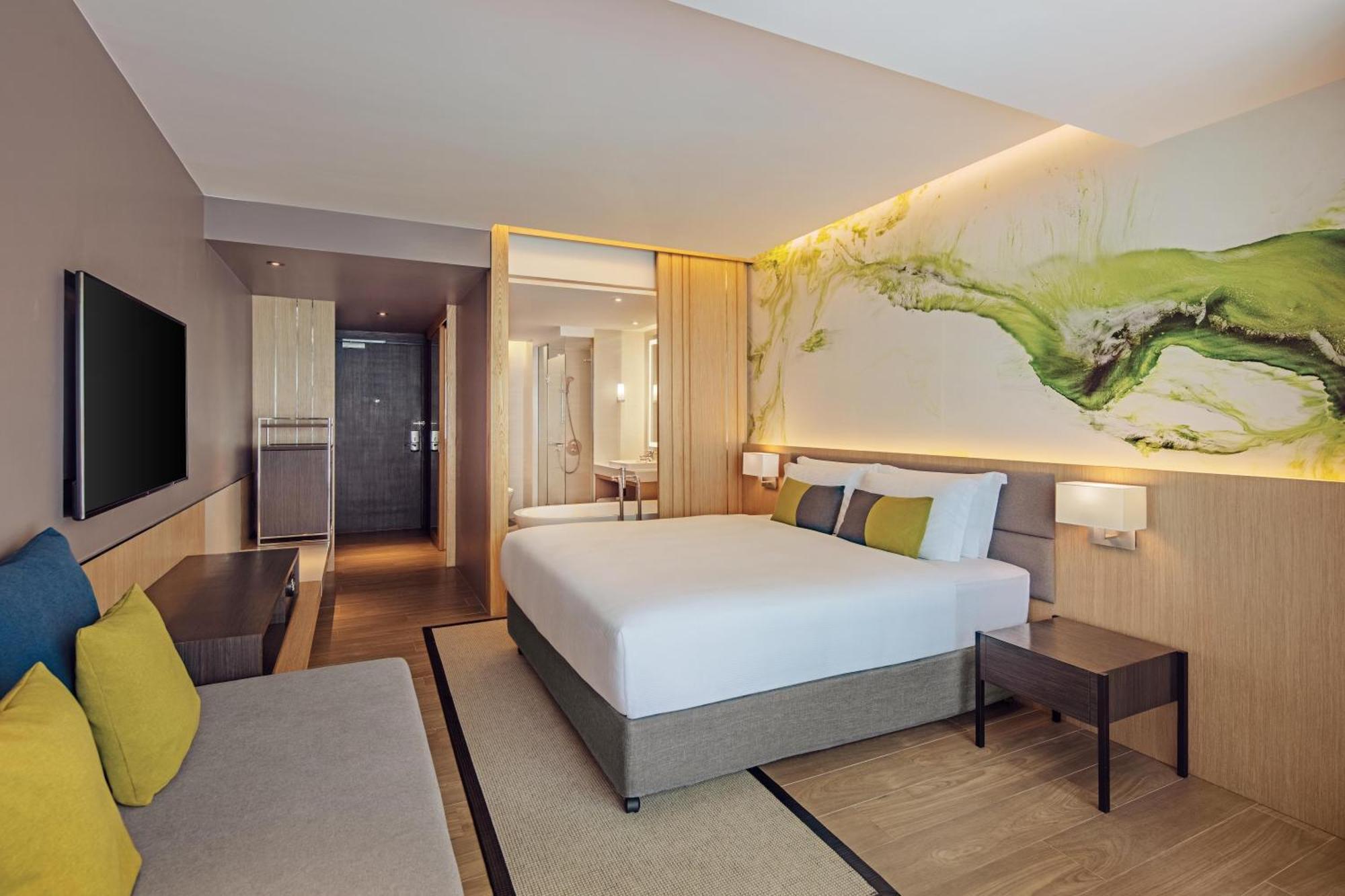 Premium Zimmer mit Kingsize-Bett – Poolseite