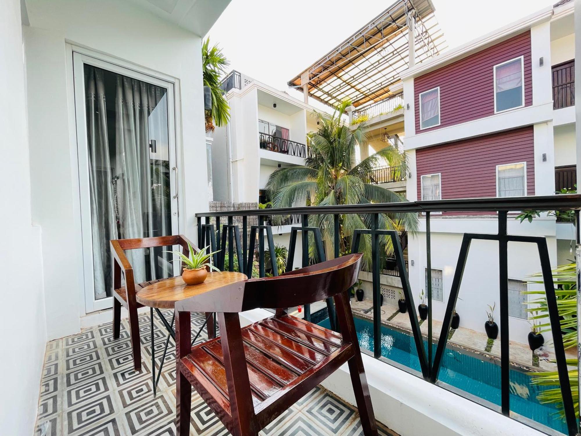 Family Deluxe With Balcony Pool View - Free Pick Up