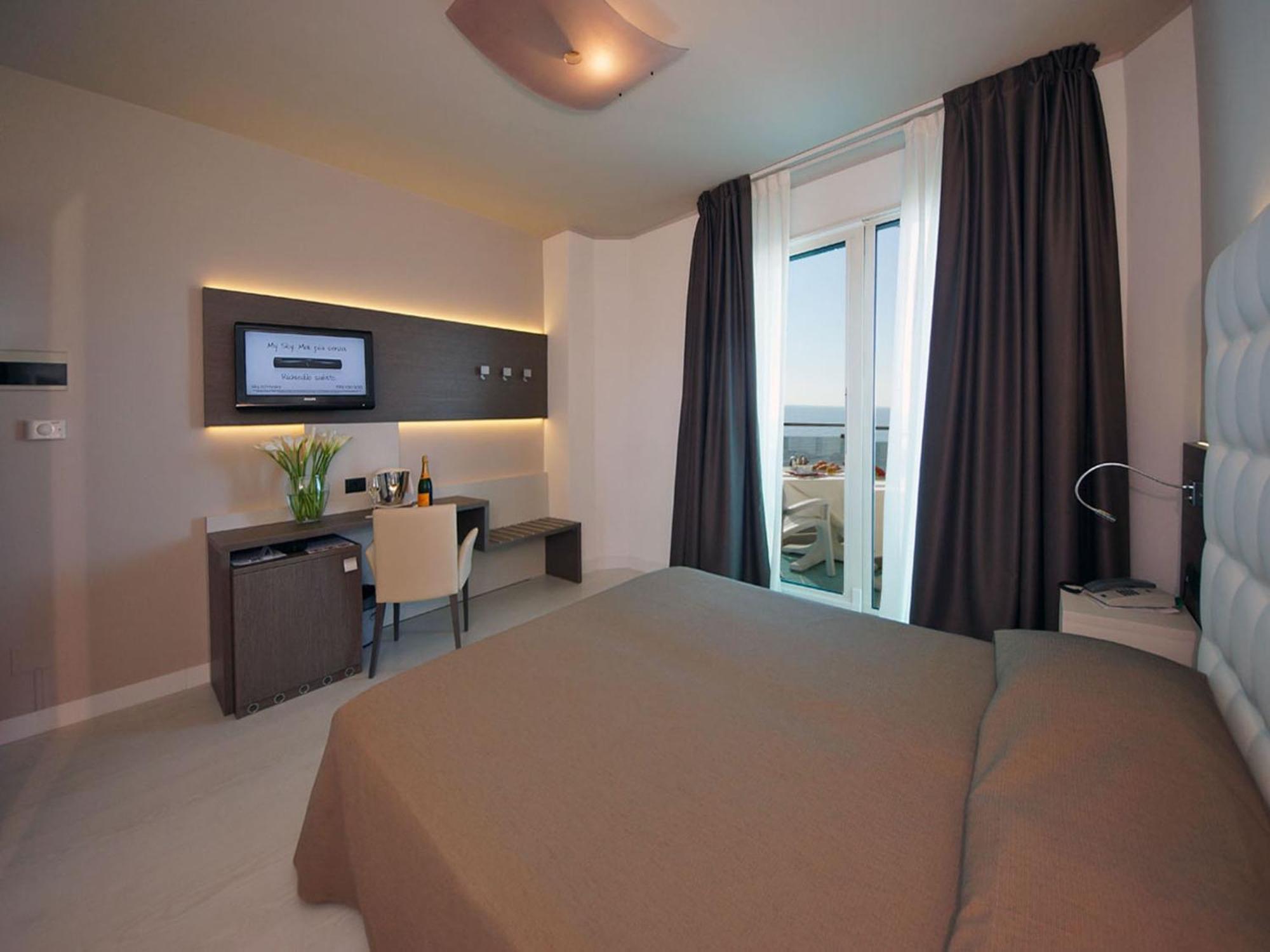 Habitación Cuádruple con balcón y vistas al mar