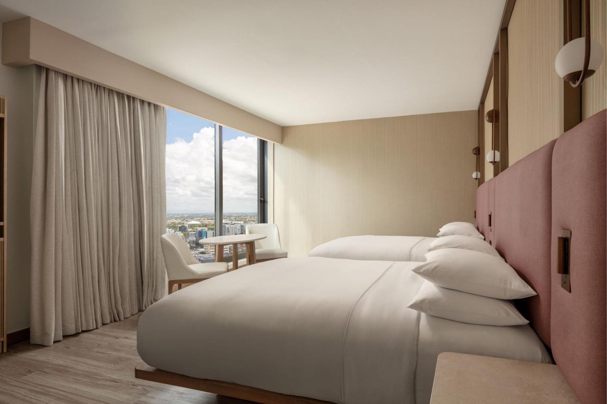 Deluxe Queen Room with Two Queen Beds and City View