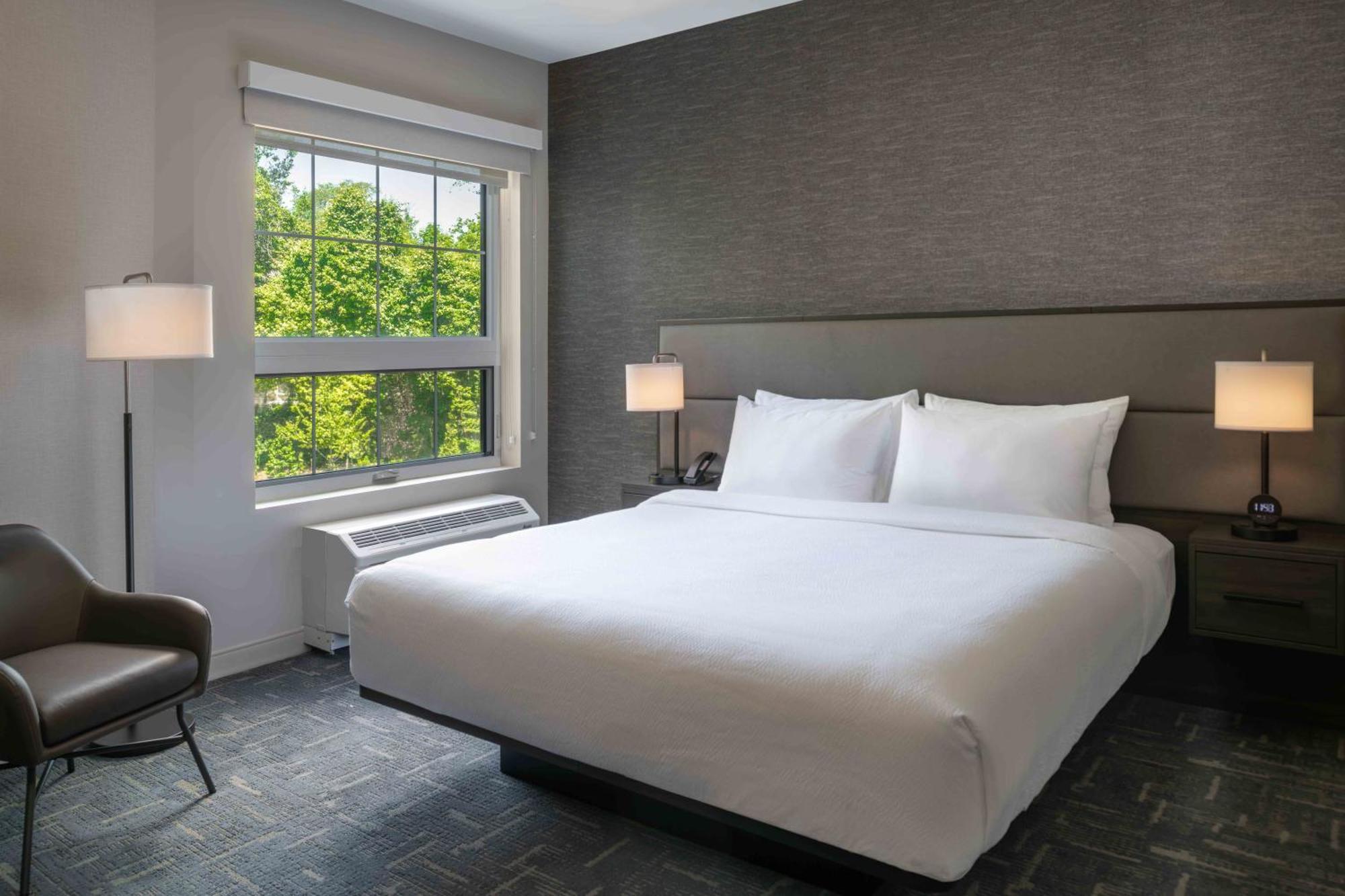 One-Bedroom Corner King Suite with Sofa Bed - Hearing Accessible