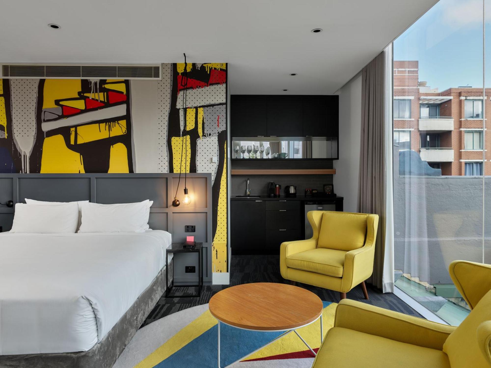 Suite mit Kingsize-Bett und Balkon