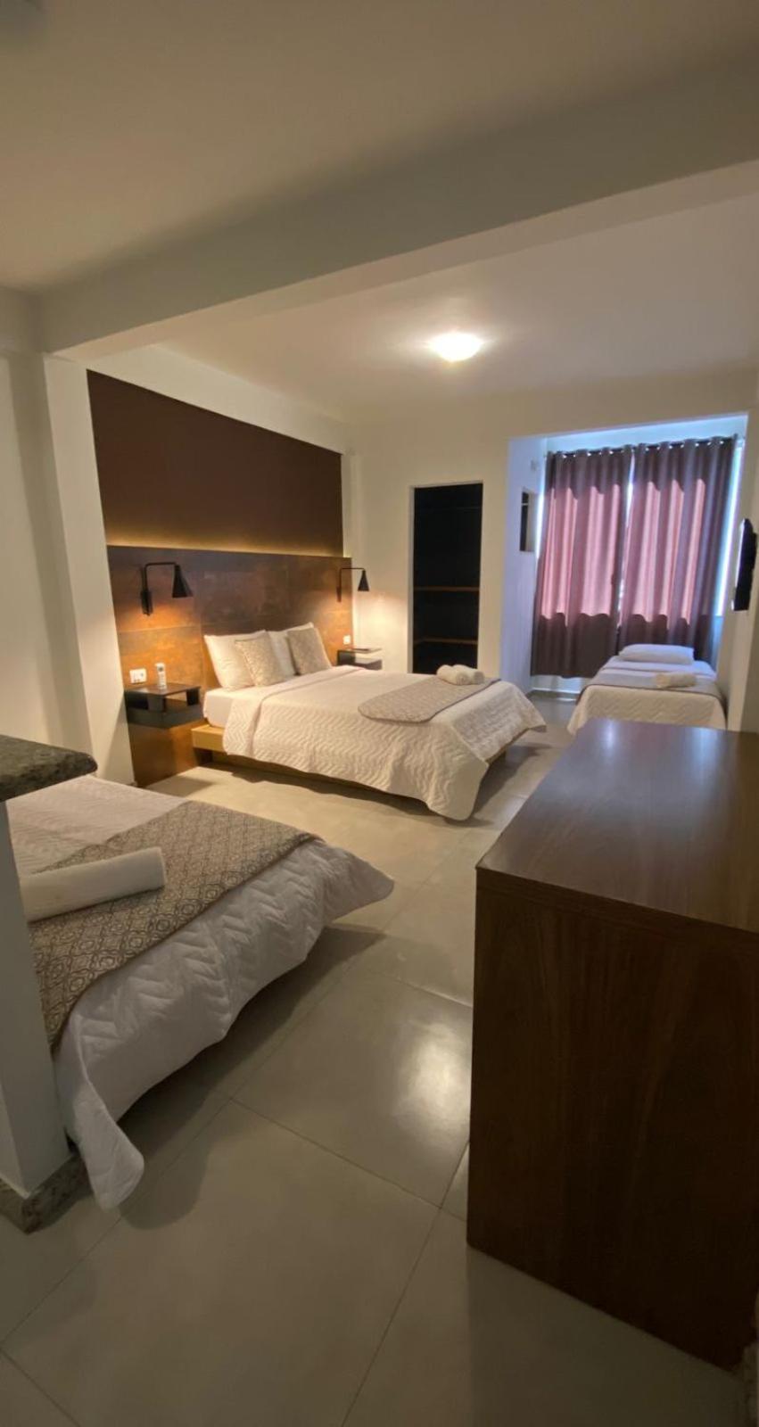 Quarto Quádruplo Premium