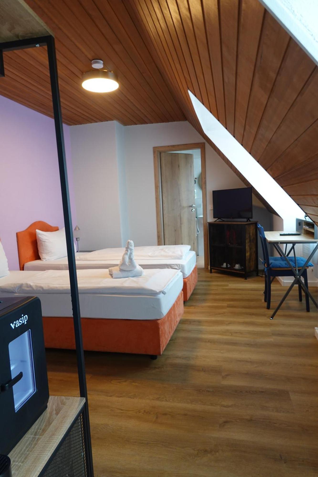 Doppel- oder Zweibettzimmer