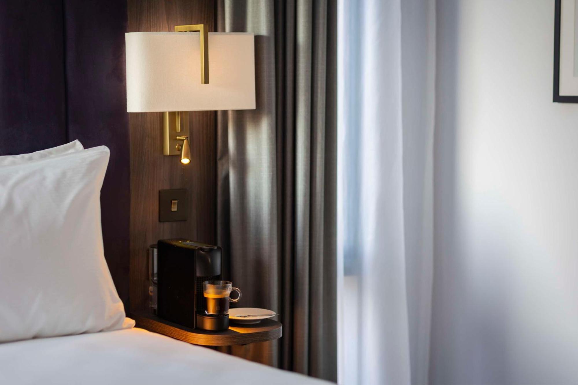 Habitación Doble Deluxe en esquina con cama grande
