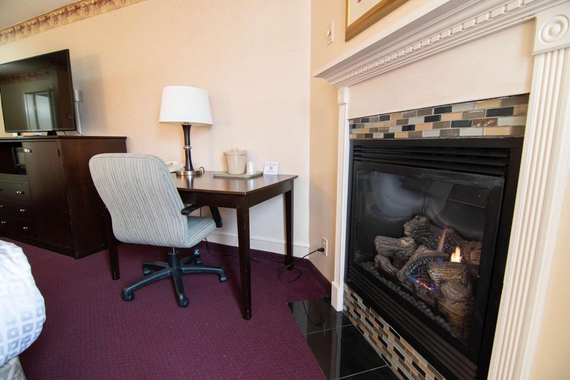 Two Queen | Fireplace | Courtyard View
