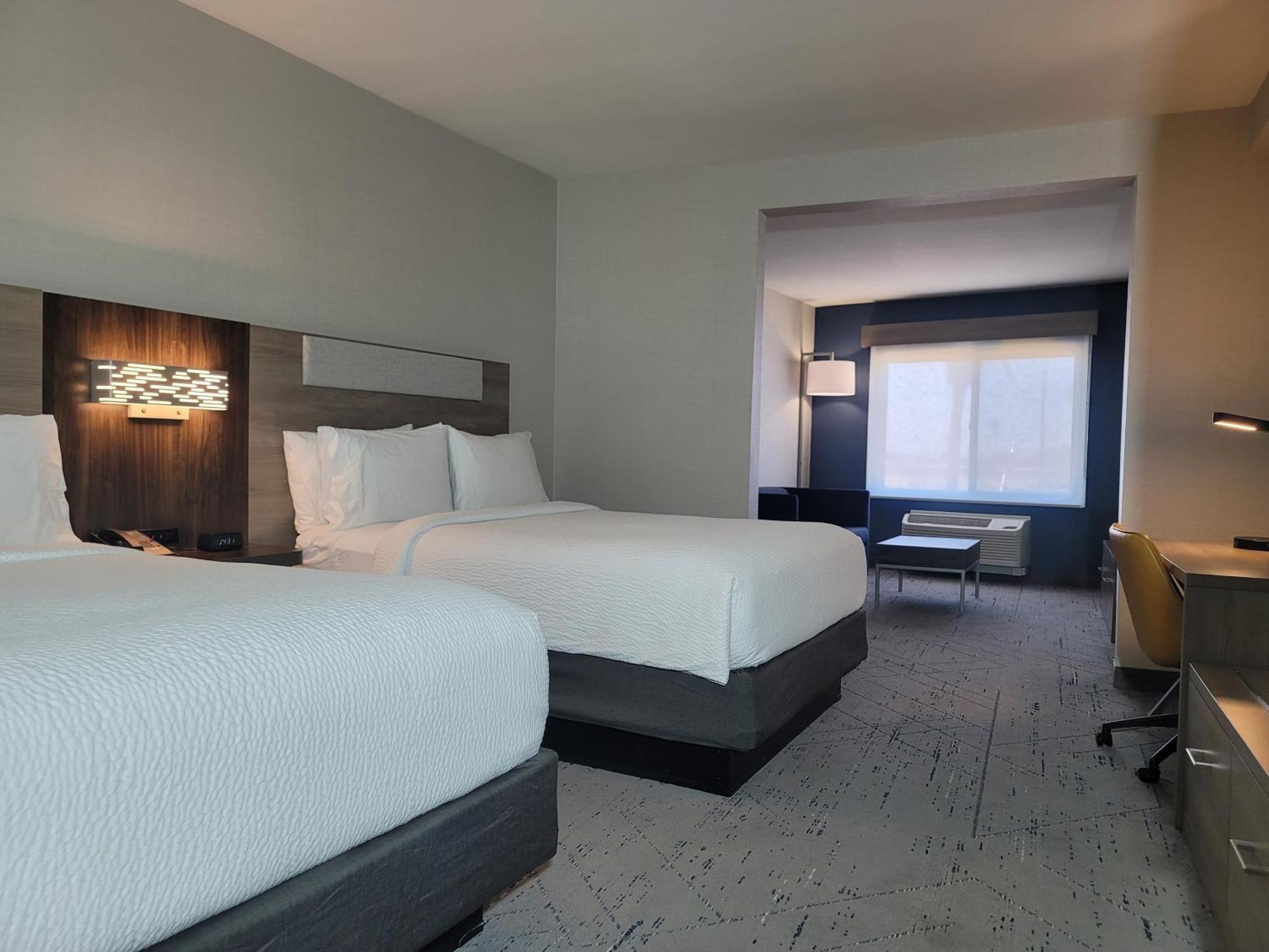 Queen Suite with Two Queen Beds and Sofa Bed