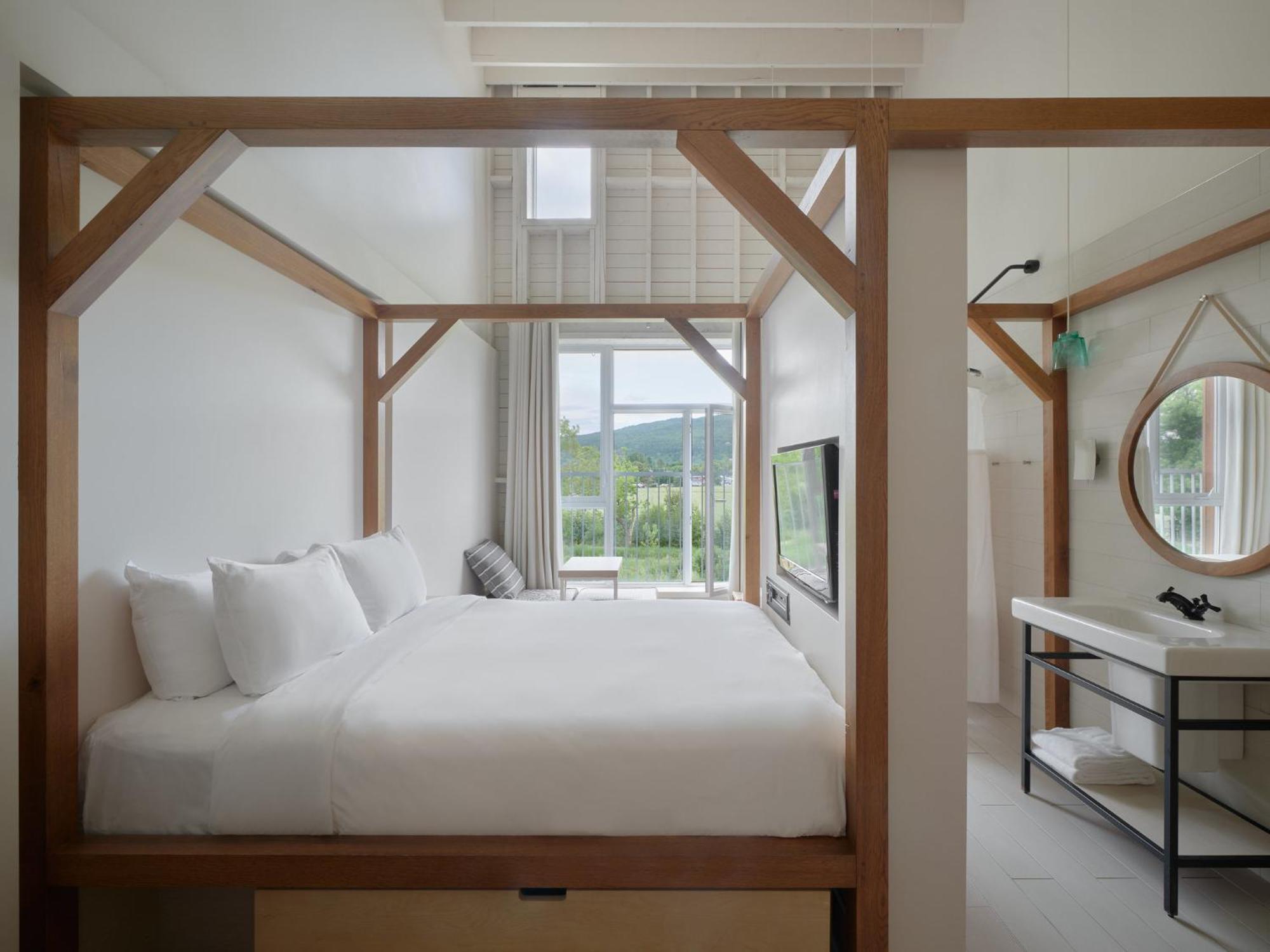 Hébergement Lit Queen-Size Classique - Bâtiment Clos