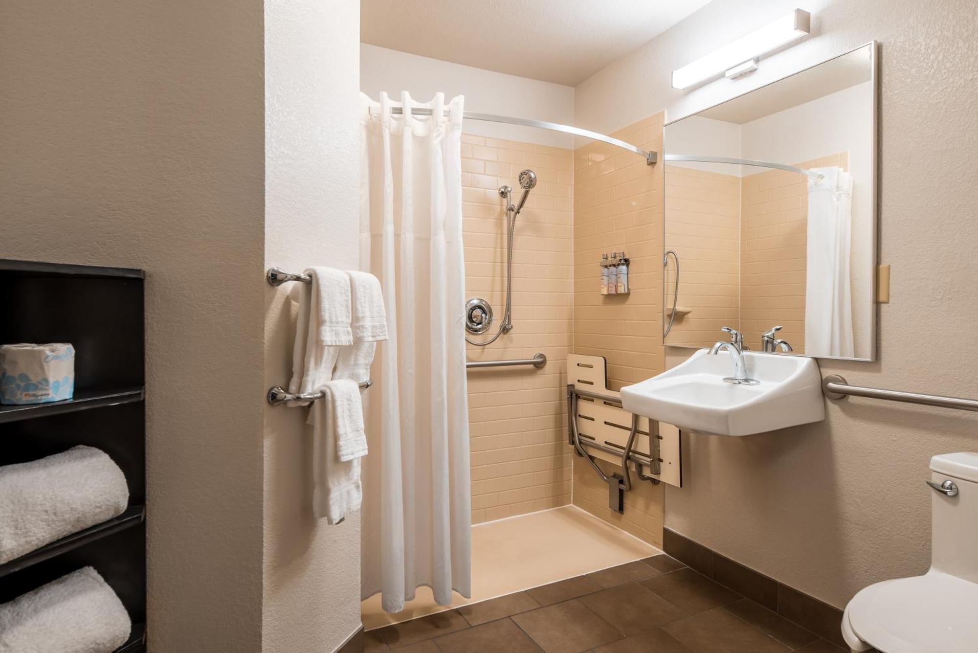 Queen Studio Suite with Roll-In Shower - Mobility Accessible