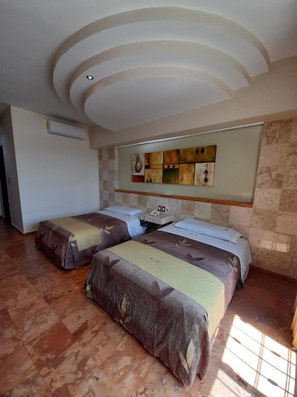 Habitación Deluxe (2 adultos + 1 niño)