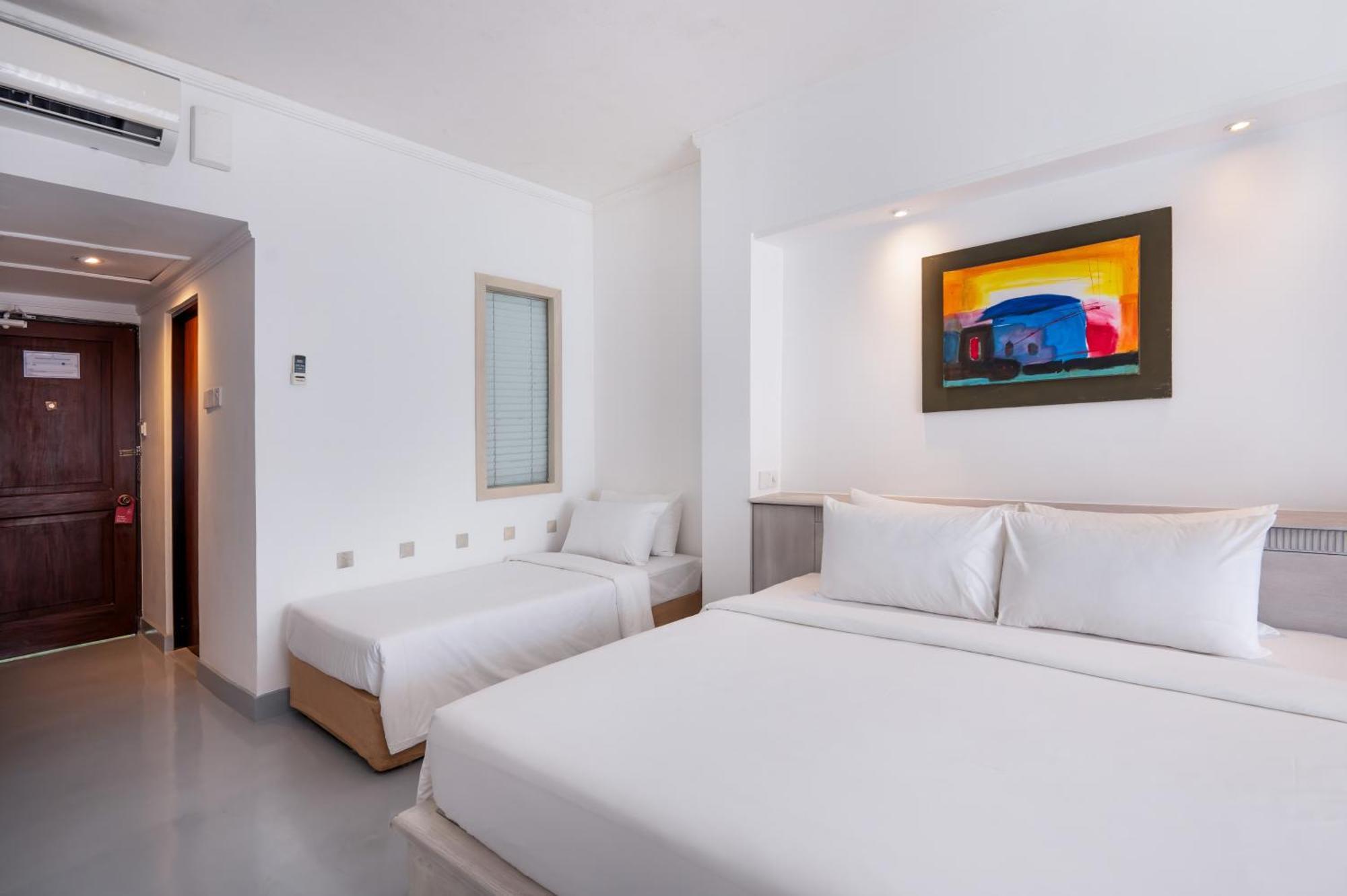 Deluxe Triple Room