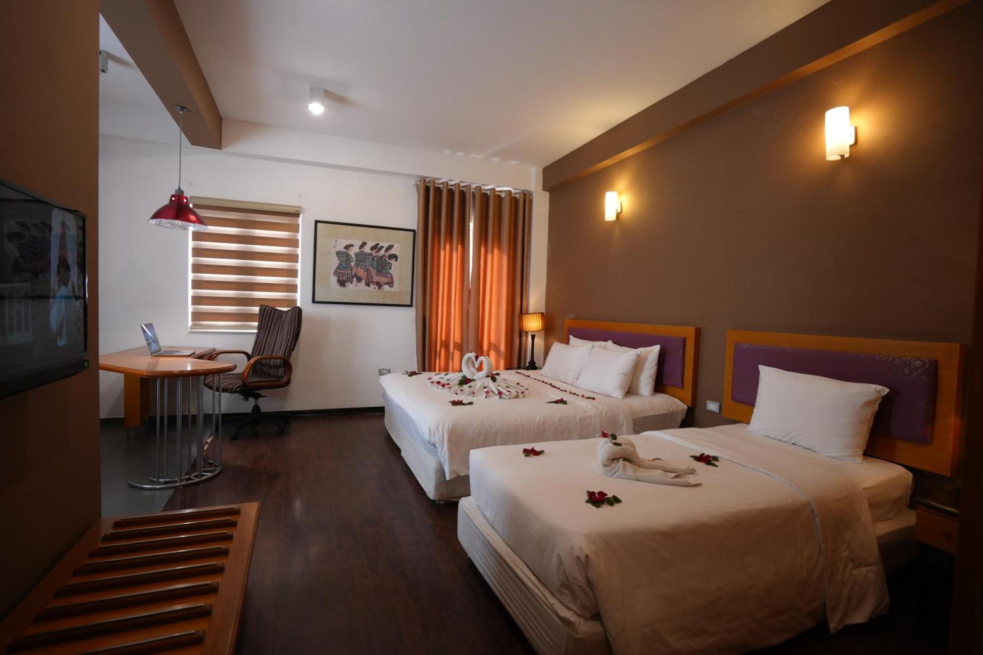 Quarto com 2 Camas de Solteiro e Varanda