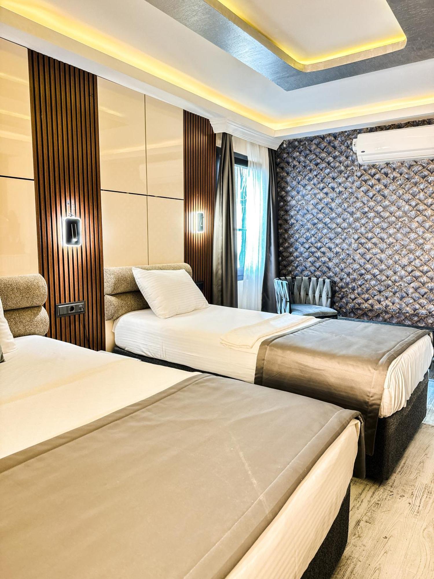 Deluxe Üç Kişilik Oda
