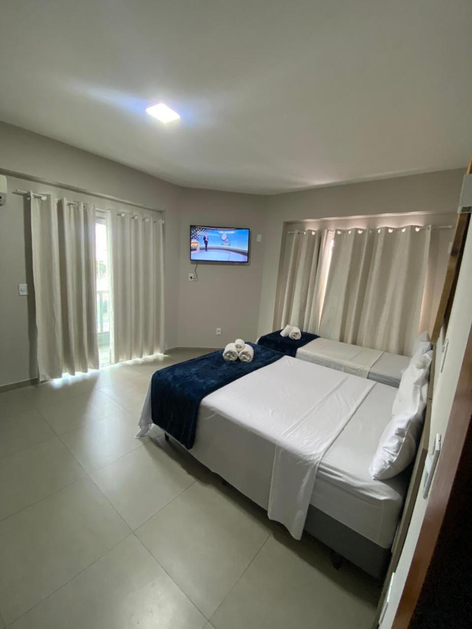 Quarto Triplo com Varanda