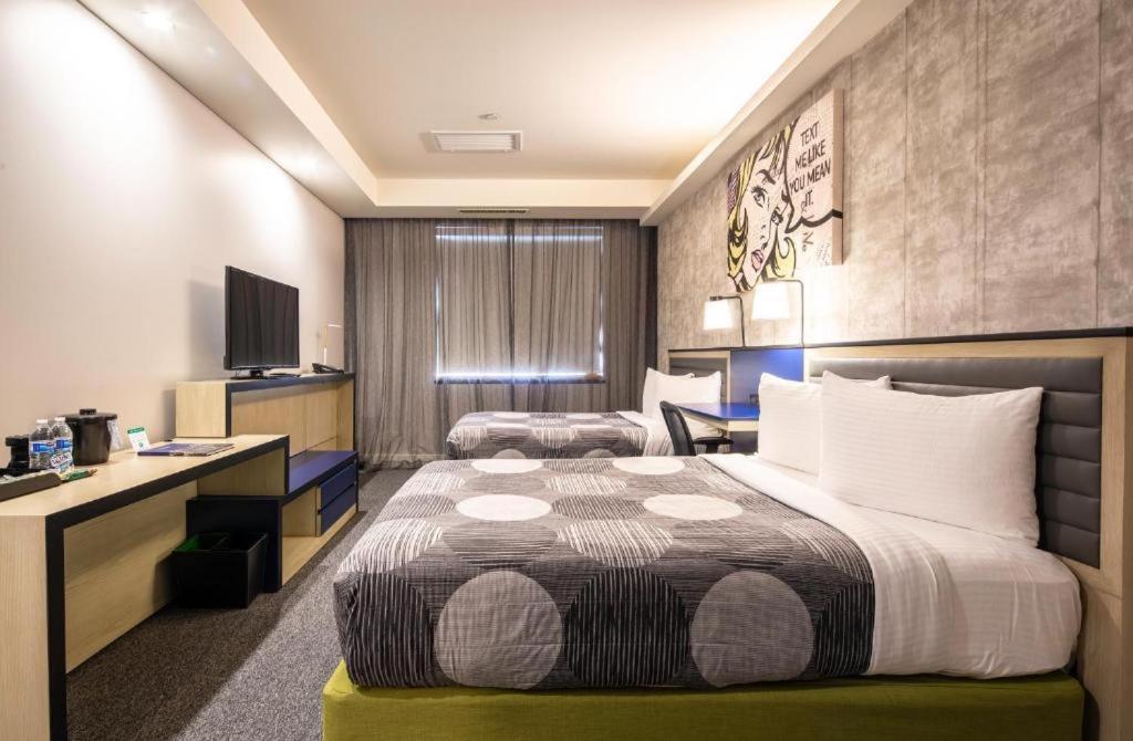Quarto Duplo Deluxe com Cama Extra