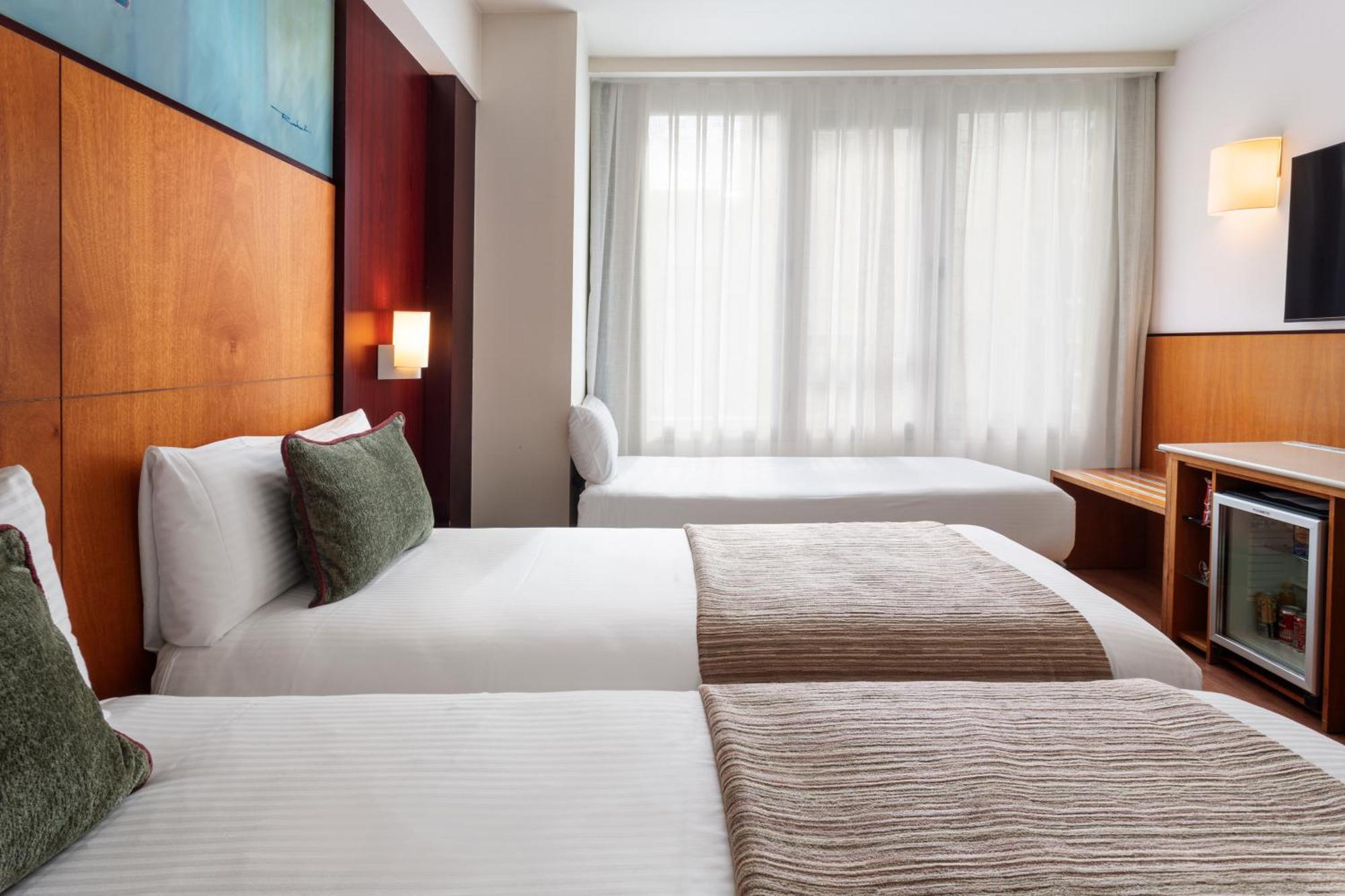 Triple Room (2 Adults + 1 Child)